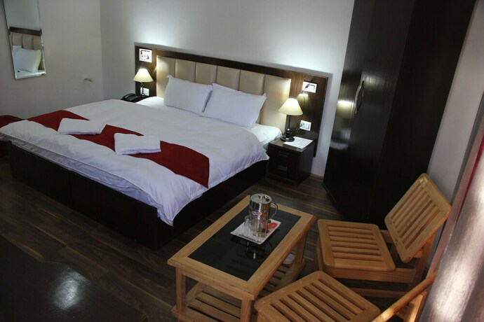 Imagen de la habitación del Hotel Kangsing. Foto 14