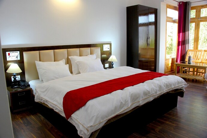 Imagen de la habitación del Hotel Kangsing. Foto 15