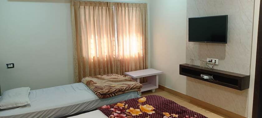 Imagen de la habitación del Hotel Kanha Ujjain. Foto 13