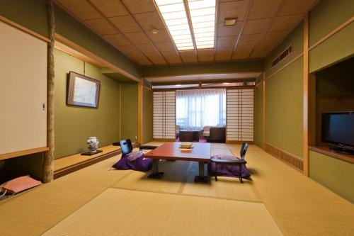 Imagen de la habitación del Hotel Kan-ichi. Foto 7