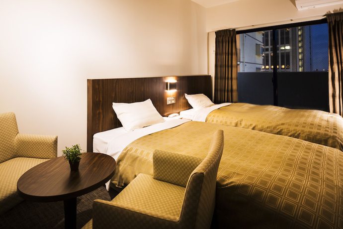 Imagen de la habitación del Hotel Kanku Izumisano First. Foto 2