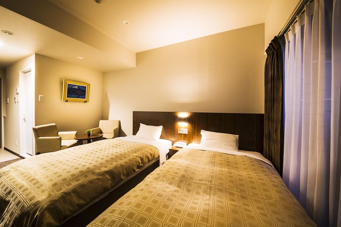 Imagen de la habitación del Hotel Kanku Izumisano First. Foto 3