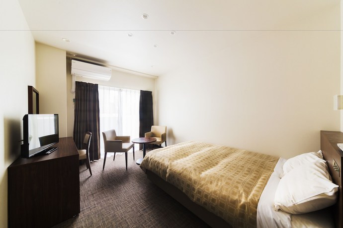 Imagen de la habitación del Hotel Kanku Izumisano First. Foto 5