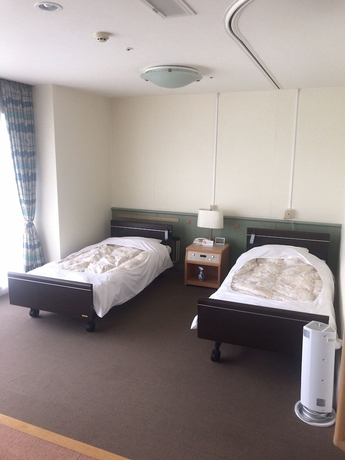 Imagen de la habitación del Hotel Kanponoyado Iwaki. Foto 11