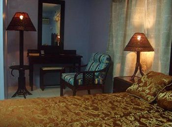 Imagen de la habitación del Hotel Kanuku Suites. Foto 2