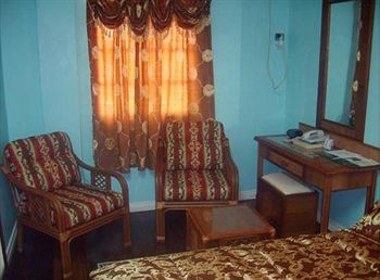 Imagen de la habitación del Hotel Kanuku Suites. Foto 7