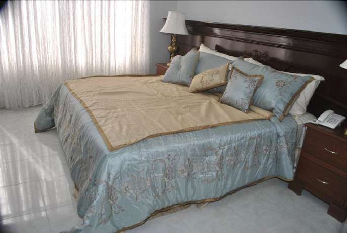 Imagen de la habitación del Hotel Kapis Mansions Hotel. Foto 6