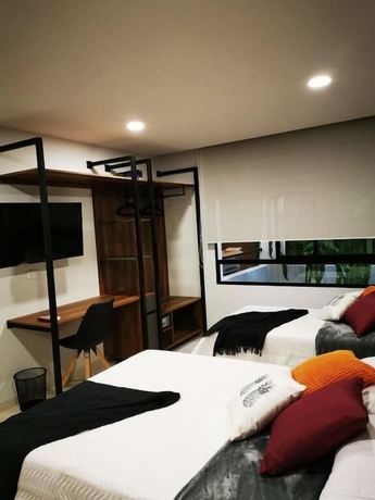 Imagen de la habitación del Hotel Kapital Suites. Foto 16