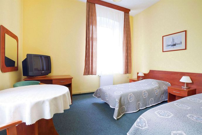 Imagen de la habitación del Hotel Kapitan. Foto 13