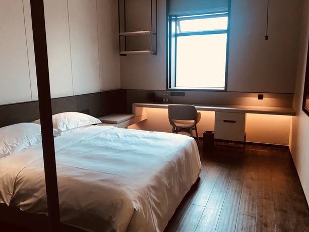 Imagen de la habitación del Hotel Kapok Bai Yang Dian. Foto 8