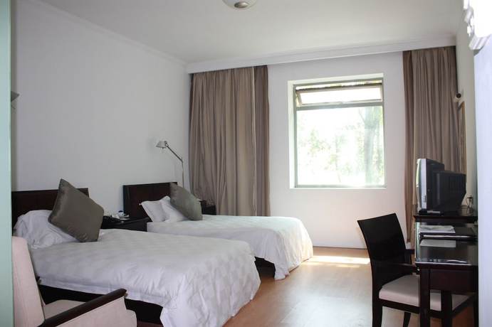 Imagen de la habitación del Hotel Kapok Bai Yang Dian. Foto 11