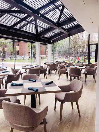 Imagen del bar/restaurante del Hotel Kapok Bai Yang Dian. Foto 6