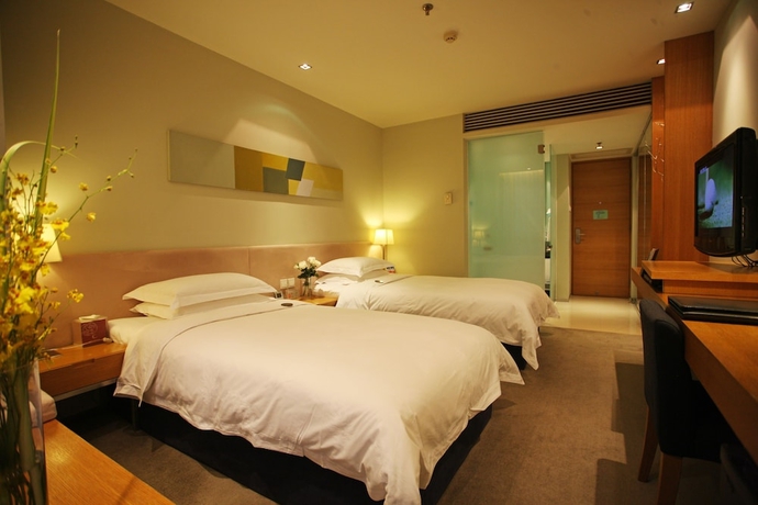 Imagen de la habitación del Hotel Kapok Wuxi. Foto 5