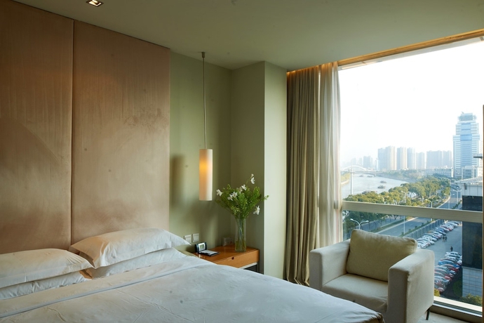 Imagen de la habitación del Hotel Kapok Wuxi. Foto 8