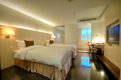 Imagen de la habitación del Hotel Kapok and Resorts. Foto 9