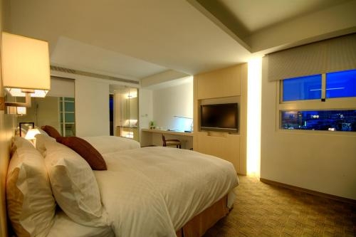 Imagen de la habitación del Hotel Kapok and Resorts. Foto 10