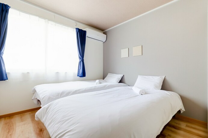 Imagen de la habitación del Hotel Kappo INN Tokusa. Foto 11