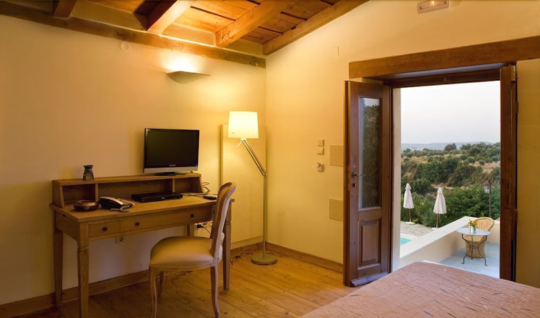 Imagen de la habitación del Hotel Kapsaliana Village. Foto 16