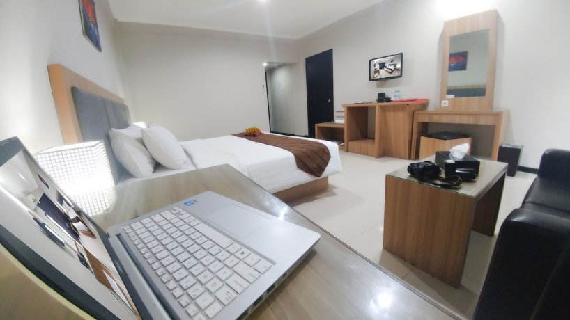 Imagen de la habitación del Hotel Kapuas Palace Pontianak. Foto 7