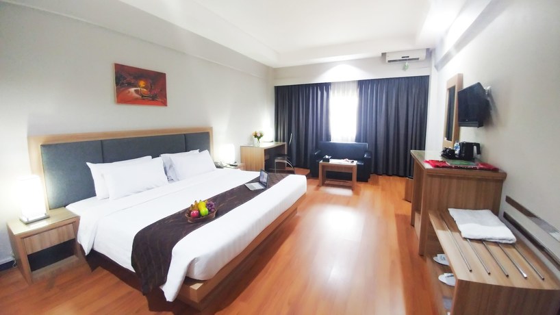 Imagen de la habitación del Hotel Kapuas Palace Pontianak. Foto 13