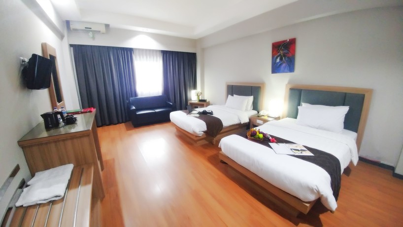 Imagen de la habitación del Hotel Kapuas Palace Pontianak. Foto 14