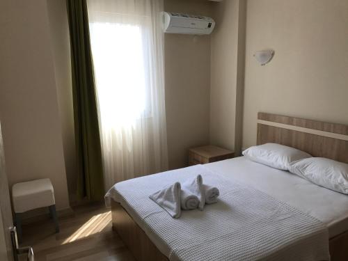 Imagen de la habitación del Hotel Karacan - Dalaman Airport. Foto 9