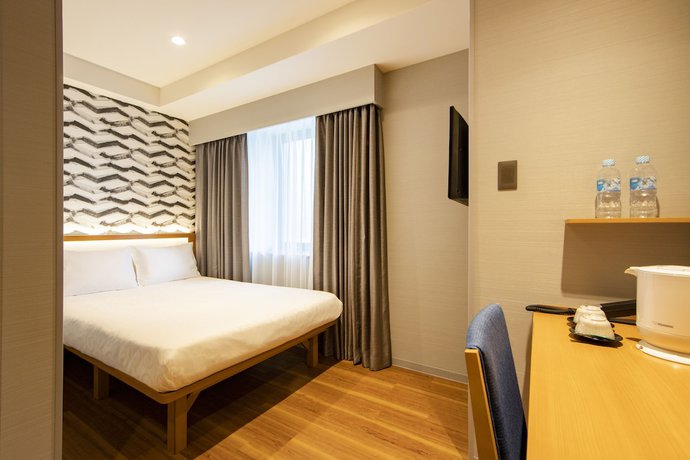 Imagen de la habitación del Hotel Karaksa Grande Shin-osaka Tower. Foto 11