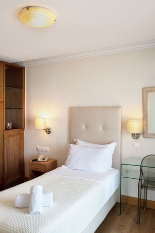 Imagen de la habitación del Hotel Karalis City. Foto 12