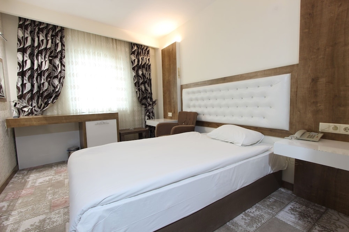 Imagen de la habitación del Hotel Karaman Kent Otel. Foto 11