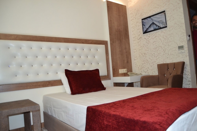 Imagen de la habitación del Hotel Karaman Kent Otel. Foto 12