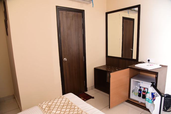 Imagen de la habitación del Hotel Karan Residency. Foto 6
