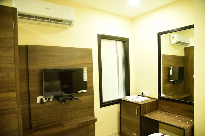 Imagen de la habitación del Hotel Karan Residency. Foto 10