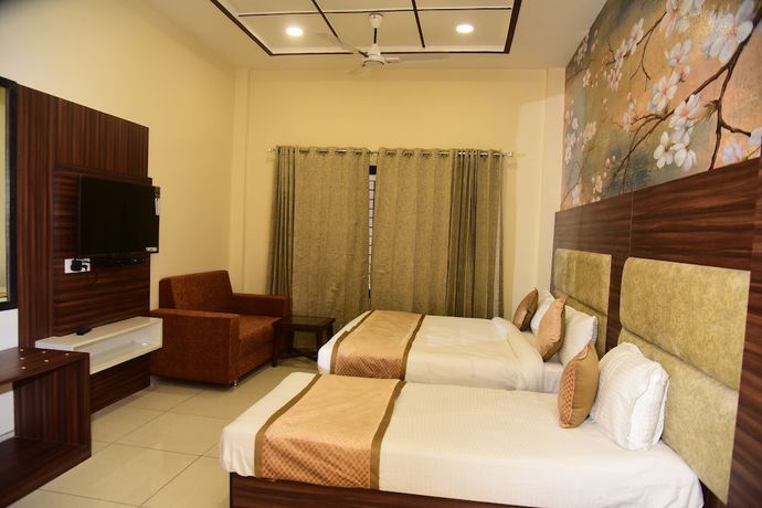 Imagen de la habitación del Hotel Karan Residency. Foto 12