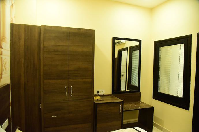 Imagen de la habitación del Hotel Karan Residency. Foto 17