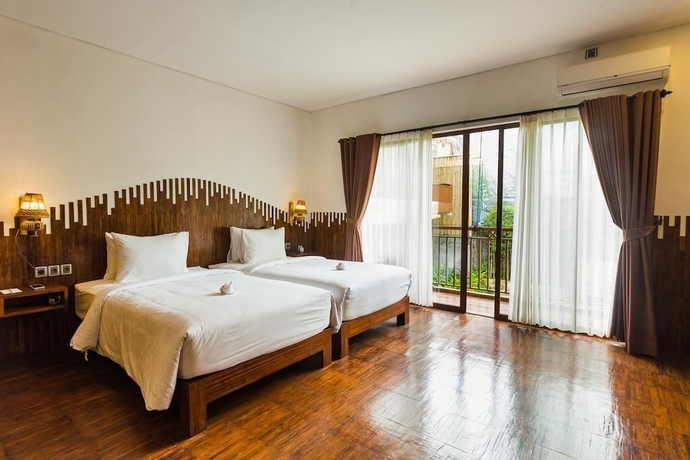 Imagen de la habitación del Hotel Karang Lila Bhuana. Foto 7
