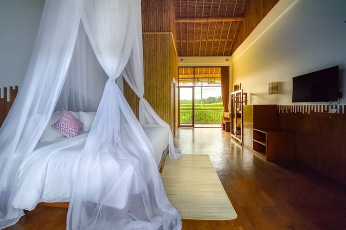 Imagen de la habitación del Hotel Karang Lila Bhuana. Foto 10