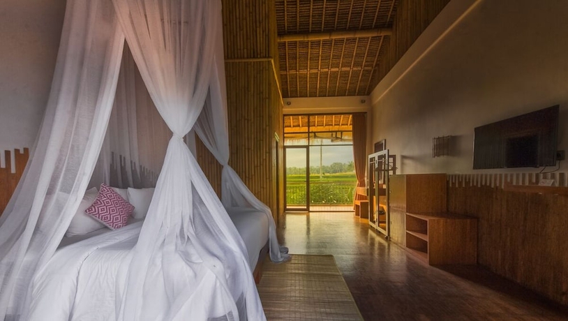 Imagen de la habitación del Hotel Karang Lila Bhuana. Foto 11