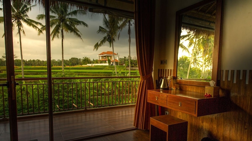 Imagen de la habitación del Hotel Karang Lila Bhuana. Foto 12