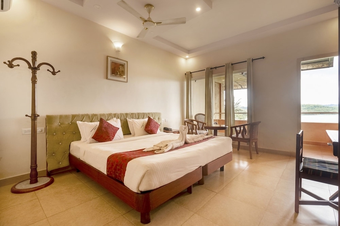 Imagen de la habitación del Hotel Karapuzha Village Resort. Foto 5