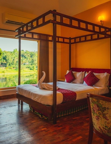 Imagen de la habitación del Hotel Karapuzha Village Resort. Foto 8