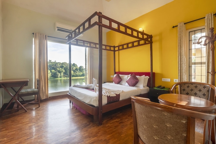 Imagen de la habitación del Hotel Karapuzha Village Resort. Foto 10