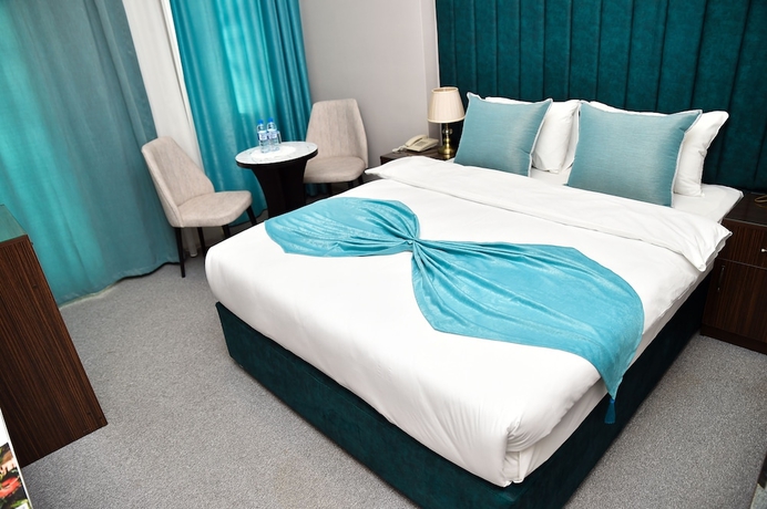 Imagen de la habitación del Hotel Karat Inn. Foto 6