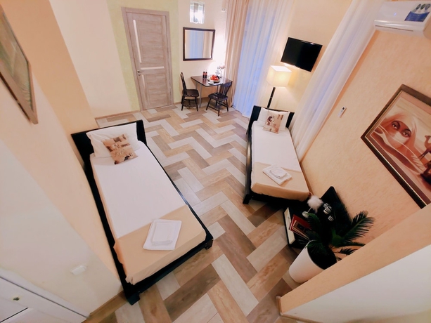 Imagen de la habitación del Hotel Karavan, Anapa. Foto 19