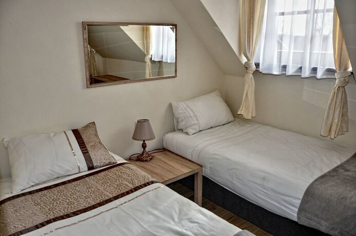 Imagen de la habitación del Hotel Karczma Rzym and Straszny Dwor. Foto 20