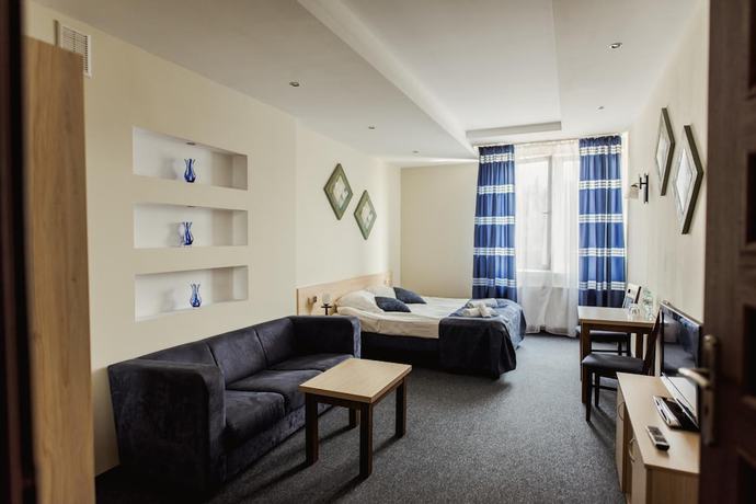 Imagen de la habitación del Hotel Kardamon. Foto 15