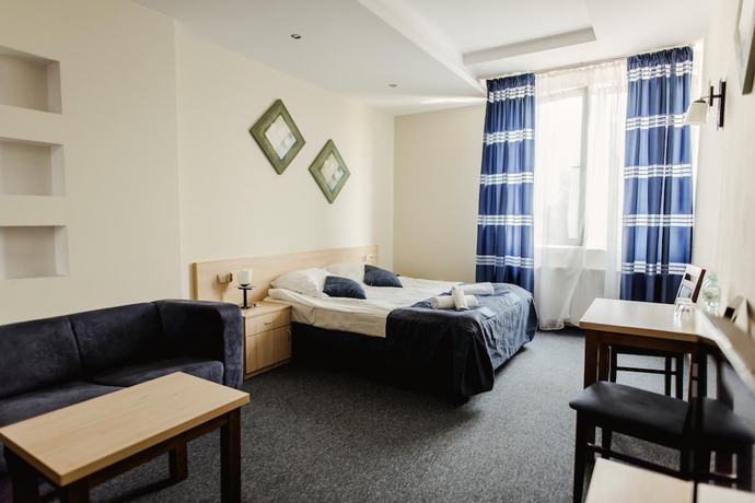 Imagen de la habitación del Hotel Kardamon. Foto 16