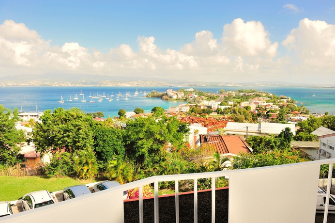 Imagen de la habitación del Hotel Karibea Camelia Residence. Foto 4