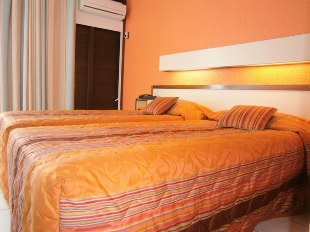 Imagen de la habitación del Hotel Karibea Camelia Residence. Foto 5