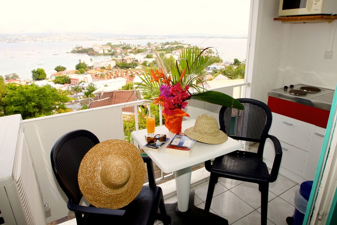 Imagen de la habitación del Hotel Karibea Camelia Residence. Foto 8