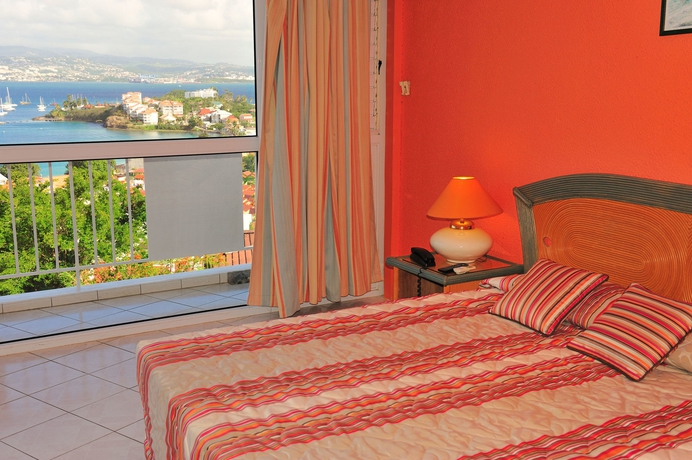 Imagen de la habitación del Hotel Karibea Camelia Residence. Foto 10